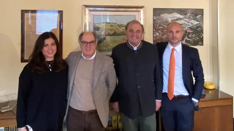 Da sinistra Carla con papà Enrico, Gianfranco con il figlio Ermanno