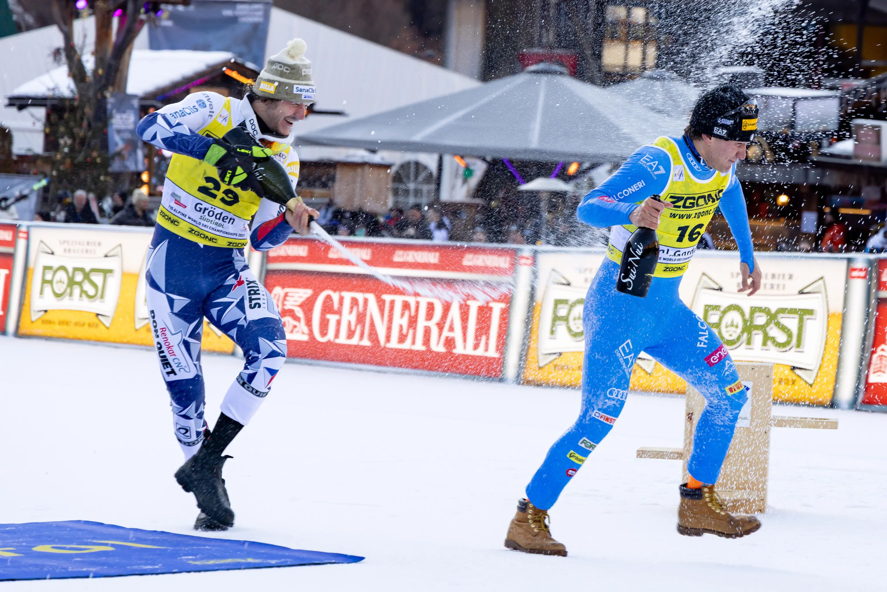 Winner Jan Zabystan (L) of Czech Republic and third placed Giovanni Franzoni (R) of Italy celebrate in the finish area after the Men's SuperG race at the FIS Alpine Skiing World Cup in Val Gardena, Italy, 19 December 2025. ANSA/LUCIANO SOLERO
