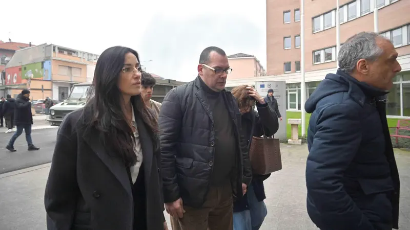 Oscar Maggi con l'avvocato Vera Cantoni al Palagiustizia © www.giornaledibrescia.it