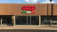 Un'insegna di un supermercato Coop - Foto Ansa © www.giornaledibrescia.it