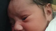 Emman Fatima e i suoi genitori