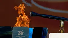 Il braciere e la fiaccola olimpica a Roma - Foto Ansa/Massimo Percossi © www.giornaledibrescia.it