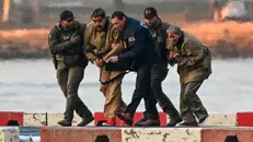 Maduro e la moglie vengono portati in tribunale - Foto Epa/Stringer © www.giornaledibrescia.it