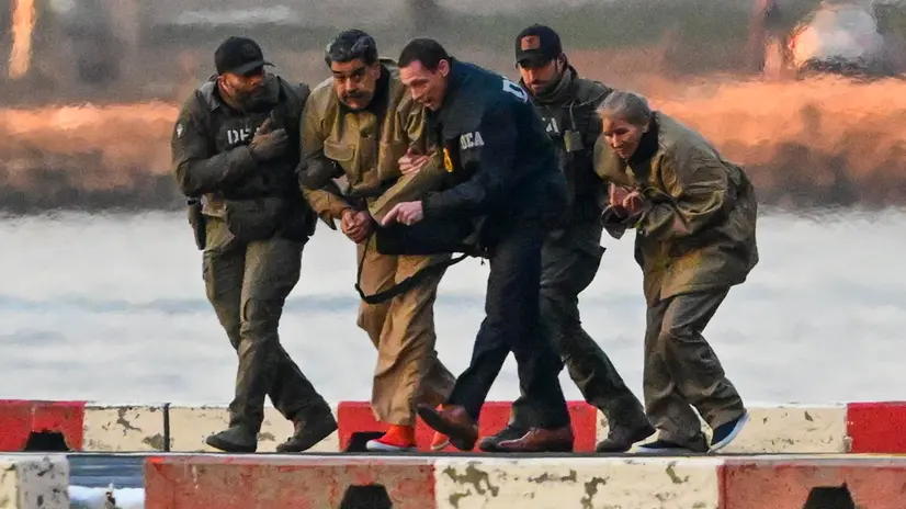 Maduro e la moglie vengono portati in tribunale - Foto Epa/Stringer © www.giornaledibrescia.it