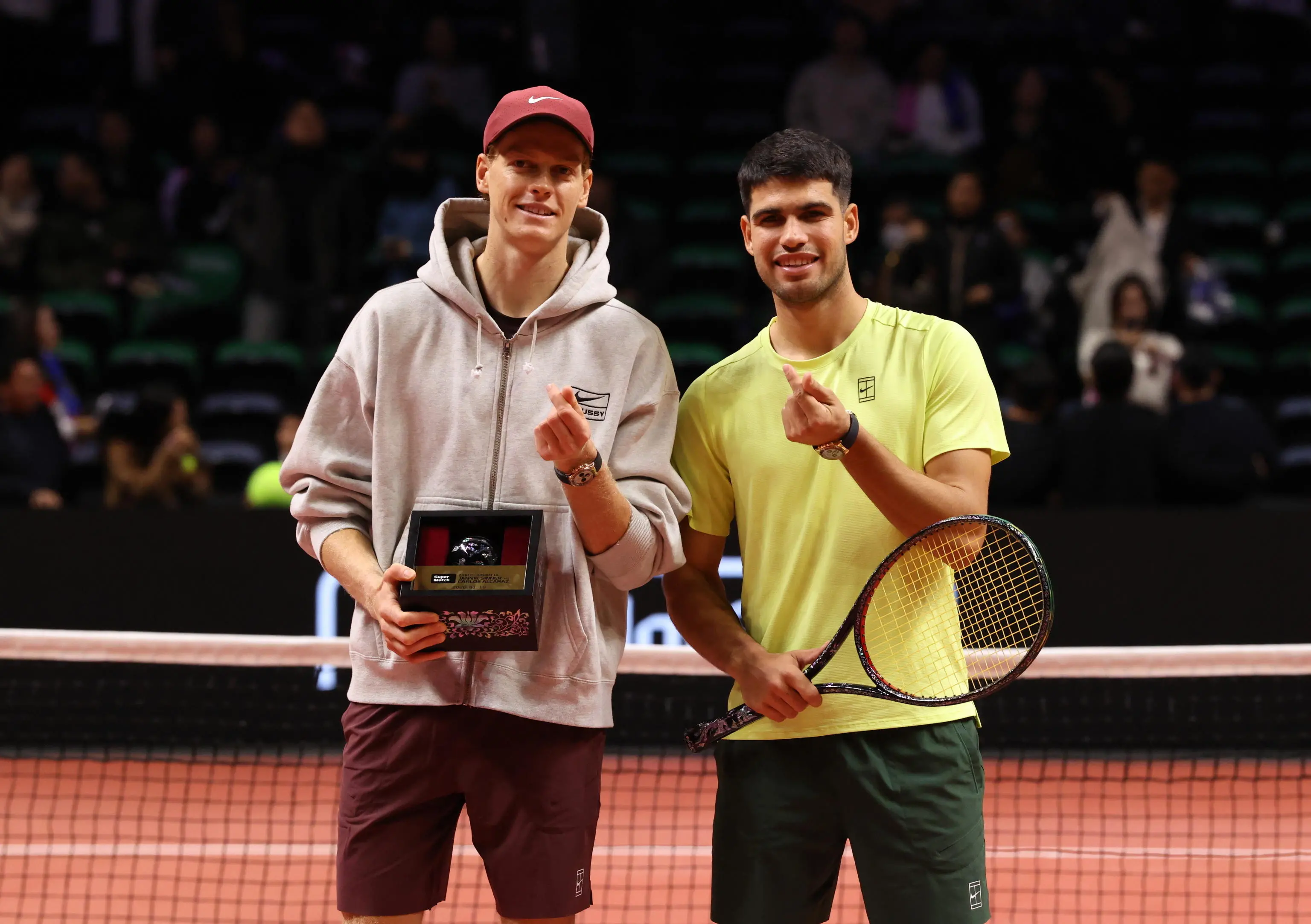 epa12640096 Jannik Sinner (L) of Italy and Carlos Alcaraz of Spain pose for photos after Alcaraz won the Hyundai Card Super Match in Incheon, South Korea, 10 January 2026. EPA/HAN MYUNG-GU