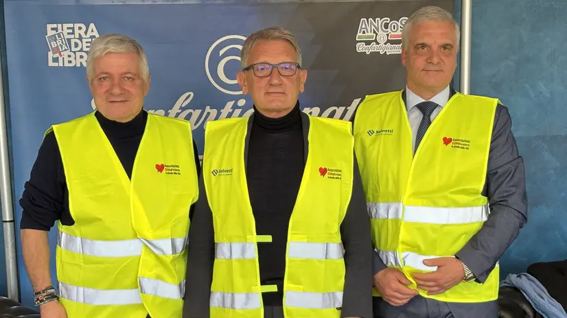 Merli, Massetti e Salvatti con i gilet catarifrangenti