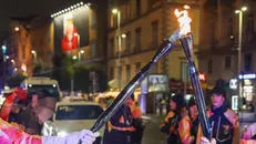 La Fiamma olimpica in viaggio per l'Italia - Foto Ansa/Cesare Abbate © www.giornaledibrescia.it