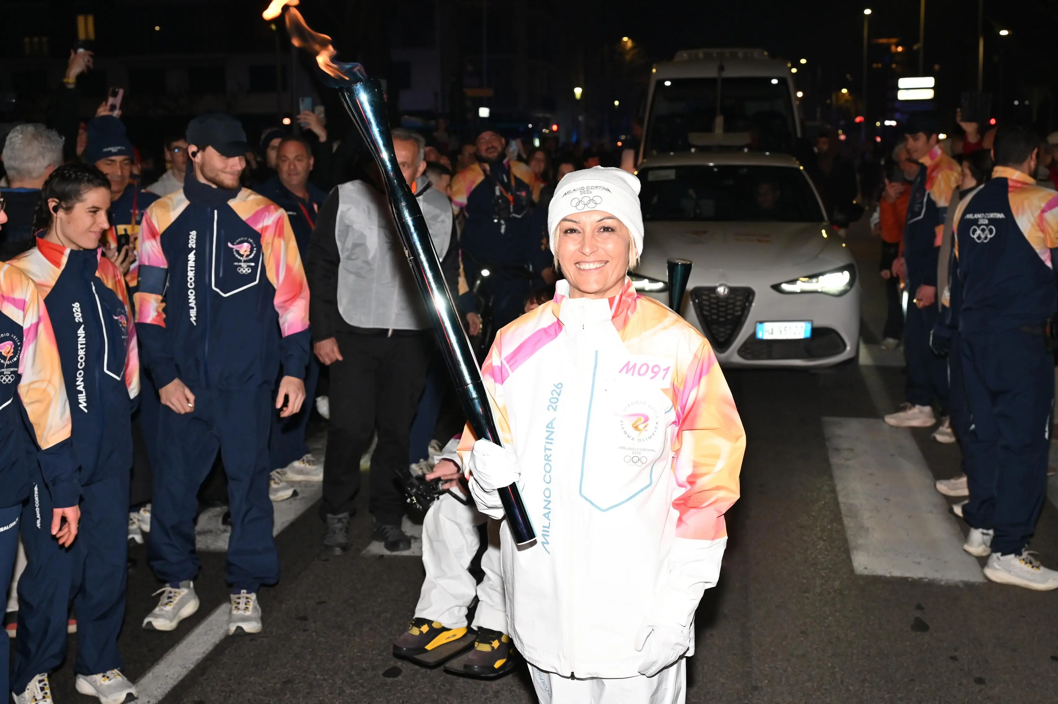 I tedofori con la Fiamma olimpica a Brescia
