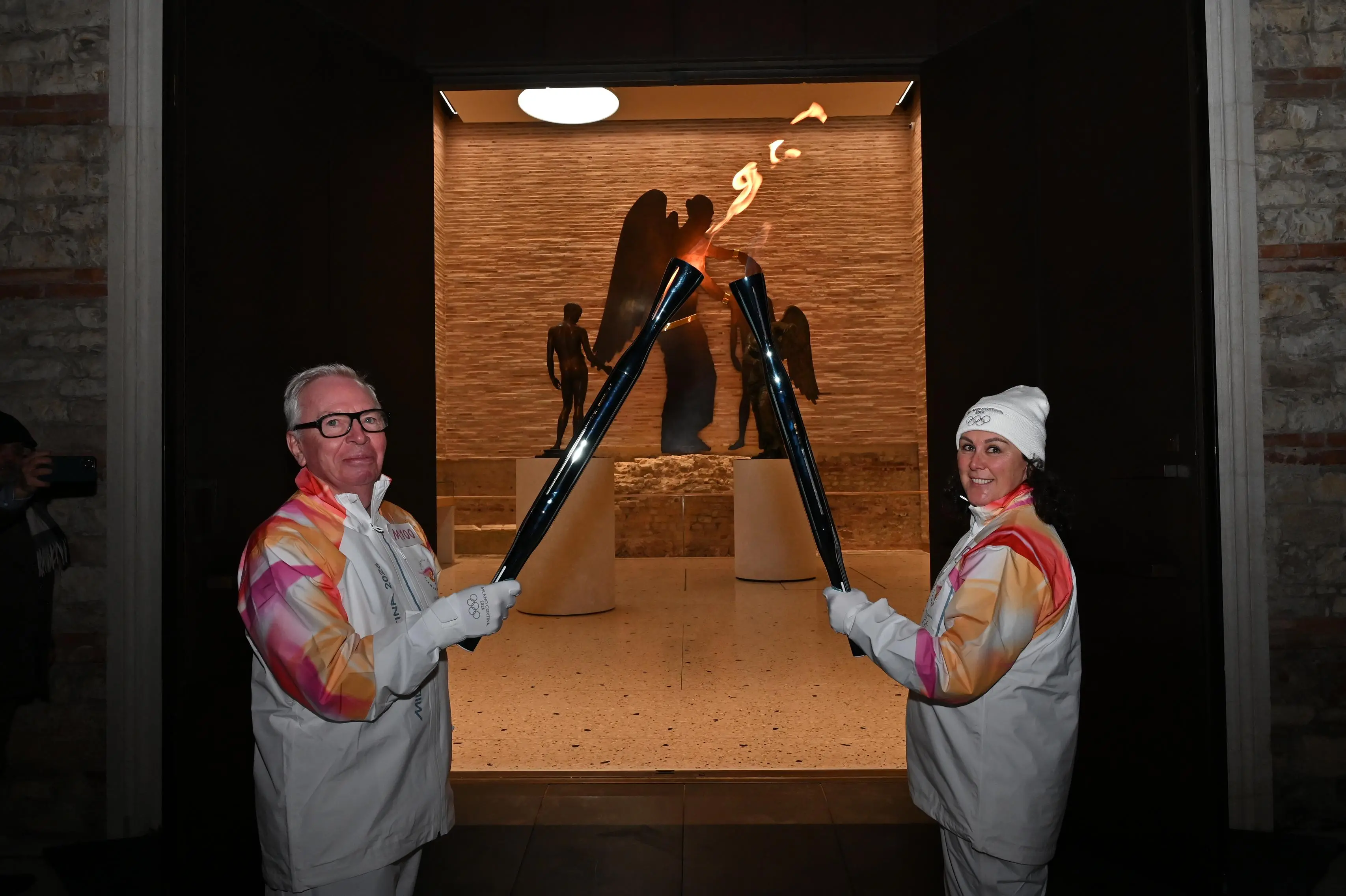 I tedofori con la Fiamma olimpica a Brescia