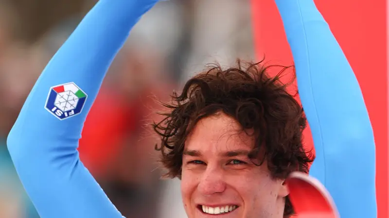 Giovanni Franzoni sul podio di Kitzbühel