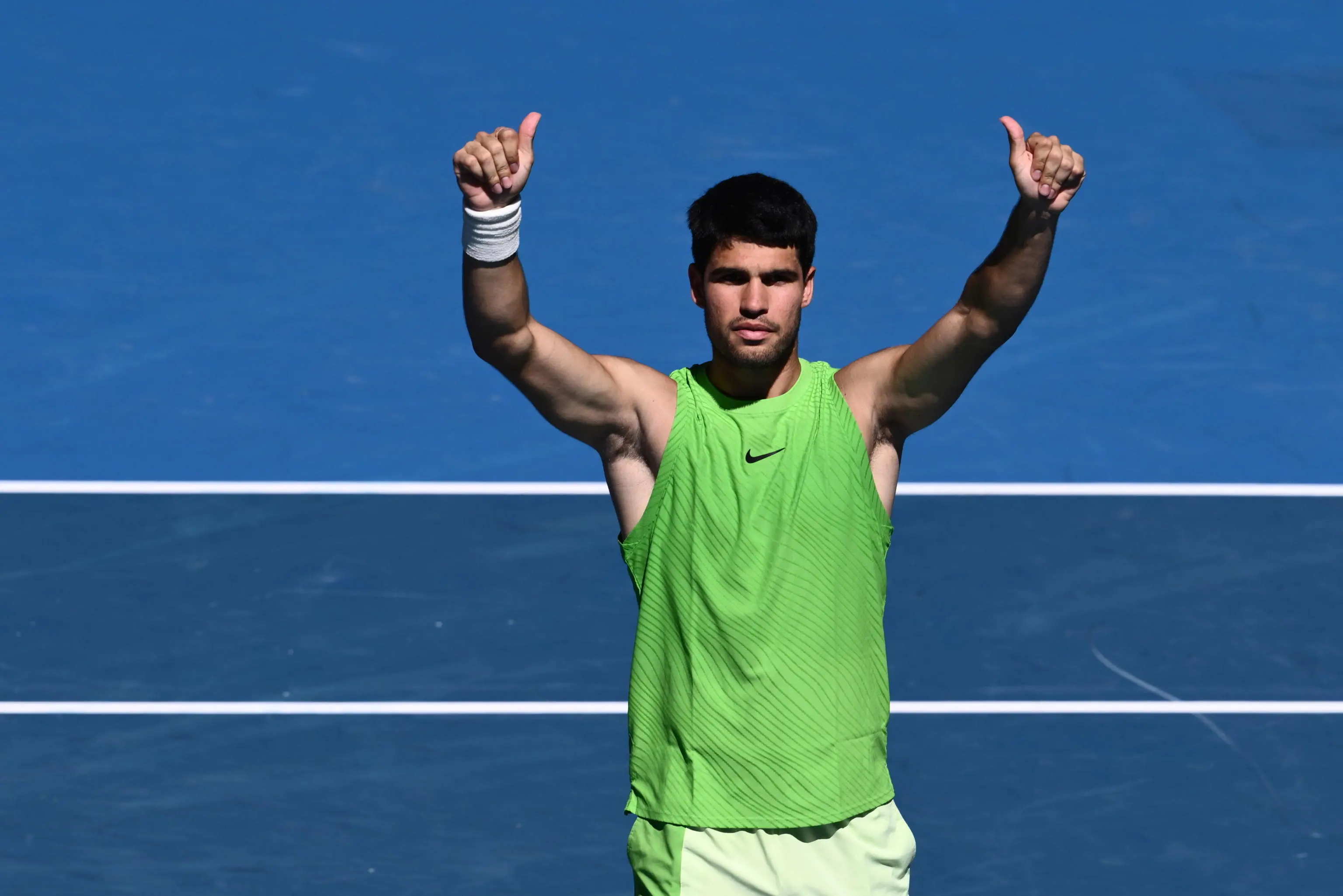 epa12673390 Carlos Alcaraz of Spain celebrates match point during his men's singles third-round match against Corentin Moutet of France on day six of the 2026 Australian Open tennis tournament at Melbourne Park in Melbourne, Australia, 23 January 2026. EPA/JOEL CARRETT NO ARCHIVING AUSTRALIA AND NEW ZEALAND OUT