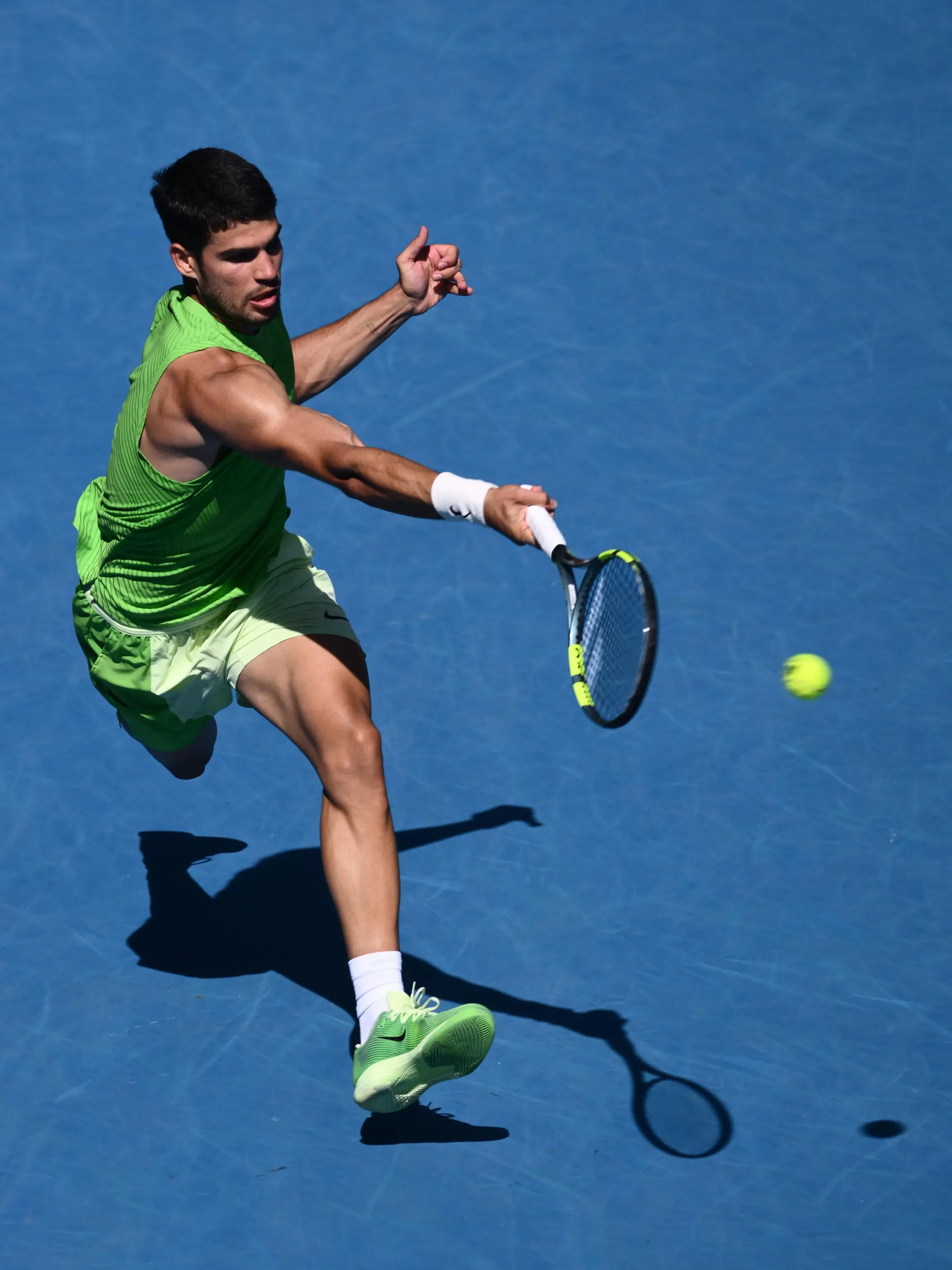 epa12678906 Carlos Alcaraz of Spain in action against Tommy Paul of the USA during their men’s fourth round match on day 8 of the 2026 Australian Open tennis tournament at Melbourne Park in Melbourne, Australia, 25 January 2026. EPA/ROB PREZIOSO AUSTRALIA AND NEW ZEALAND OUT