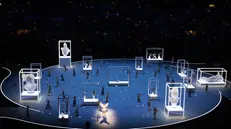 epa12709887 Performers dance during the 'Italian Armonia: Beauty' performance of the Opening Ceremony of the Milano Cortina 2026 Winter Olympic Games, in Milan, Italy, 06 February 2026. EPA/NEIL HALL