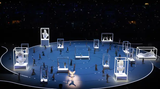 epa12709887 Performers dance during the 'Italian Armonia: Beauty' performance of the Opening Ceremony of the Milano Cortina 2026 Winter Olympic Games, in Milan, Italy, 06 February 2026. EPA/NEIL HALL