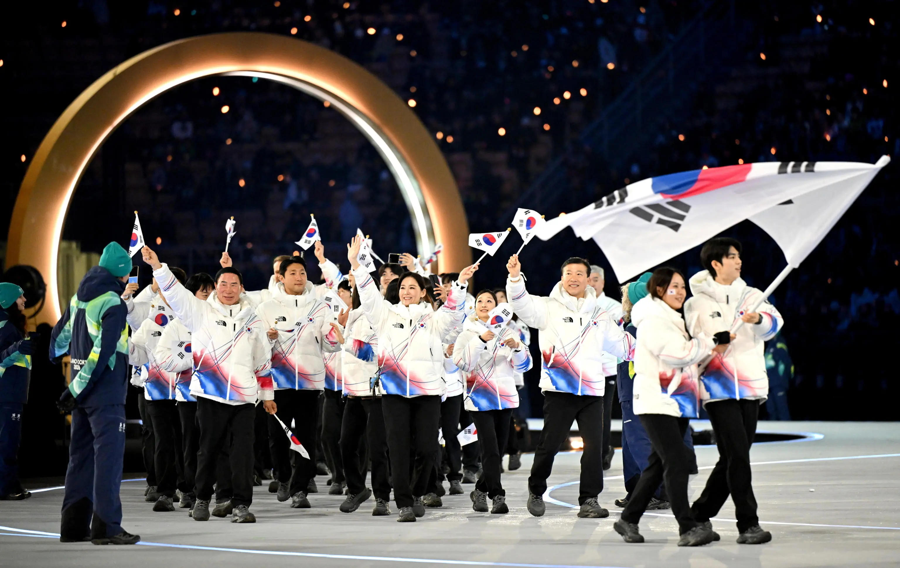 epa12710591 The delegation of South Korea arrive to the Opening Ceremony at the Milano Cortina 2026 Winter Olympic Games at the San Siro Stadium, in Milan, Italy, 06 February 2026. EPA/PETER KNEFFEL / POOL