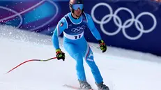 Lo sciatore bresciano in gara - Foto Ansa/Epa/Anna Szilagyi © www.giornaledibrescia.it