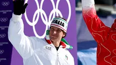 Giovanni Franzoni sul podio - Foto Epa/Anna Szilagyi © www.giornaledibrescia.it