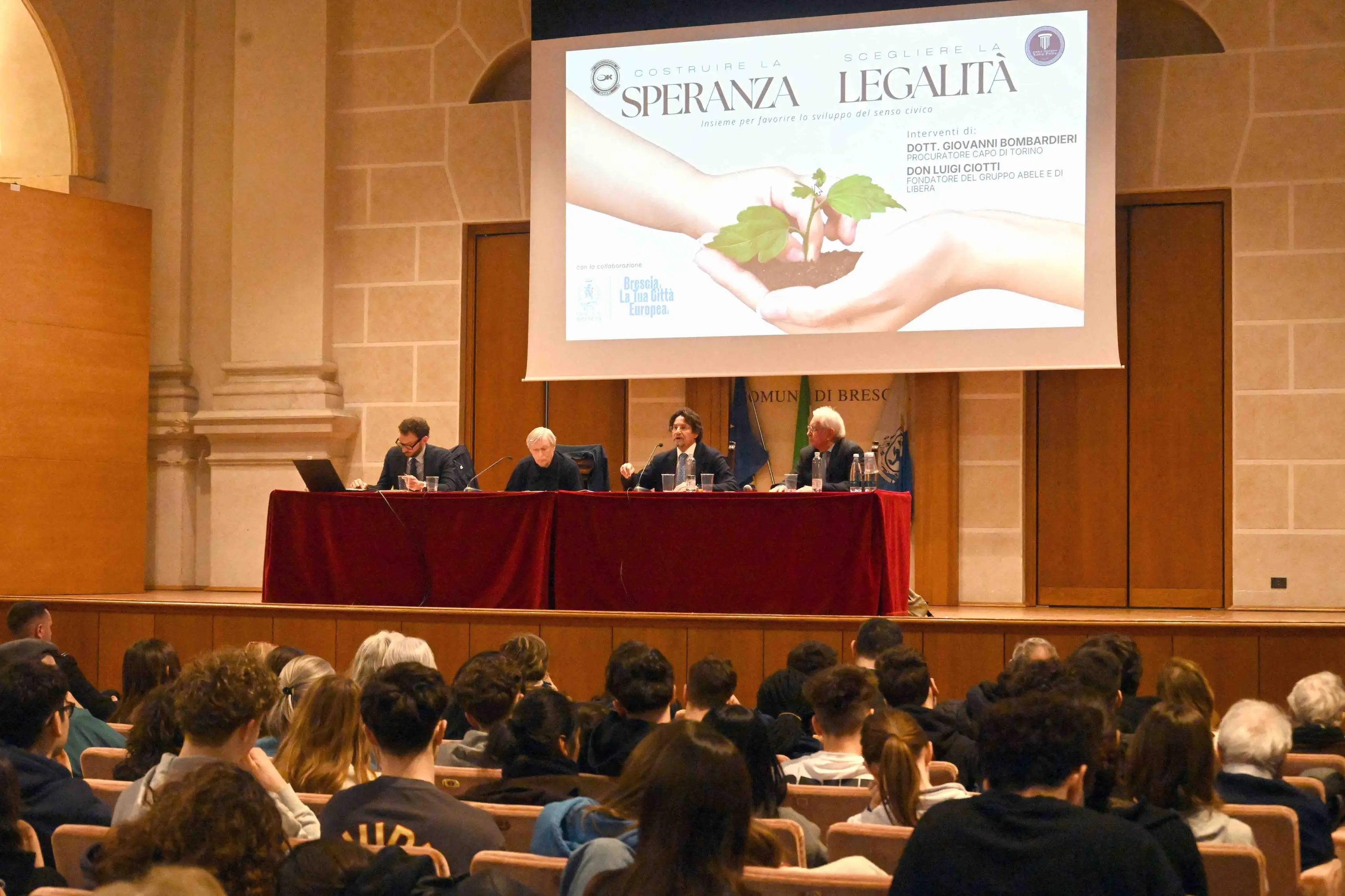 CRONACA BRESCIA AUDITORIUM SAN BARNABA SPERANZA E LEGALITA' NELLA FOTO DA SX CITTADINI CIOTTI BOMBARDIERI CAPELLO PER CARINI 23-02-2026 MARCO ORTOGNI NEW EDEN GROUP
