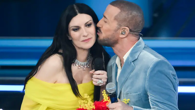 Italian singer Laura Pausini (L) with Italian singer Raf (R) on stage at the Ariston theatre during the 76th edition of the Sanremo Italian Song Festival, in Sanremo, Italy, 26 February 2026. The music festival will run from 24 to 28 February 2026. ANSA/ETTORE FERRARI