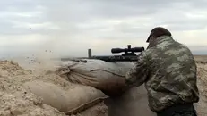 Un combattente curdo, foto Flickr d'archivio