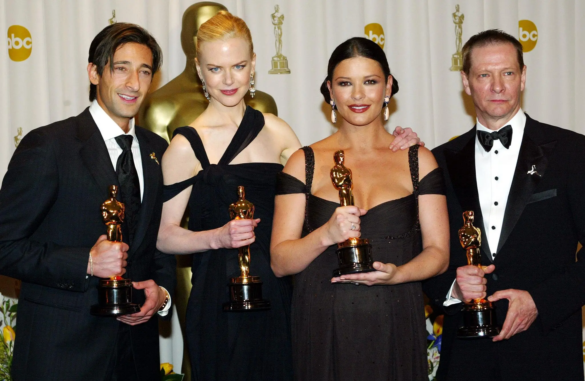 Adrien Brody, Nicole Kidman, Catherine Zeta-Jones e Chris Cooper con gli Oscar / A PAGINA 28