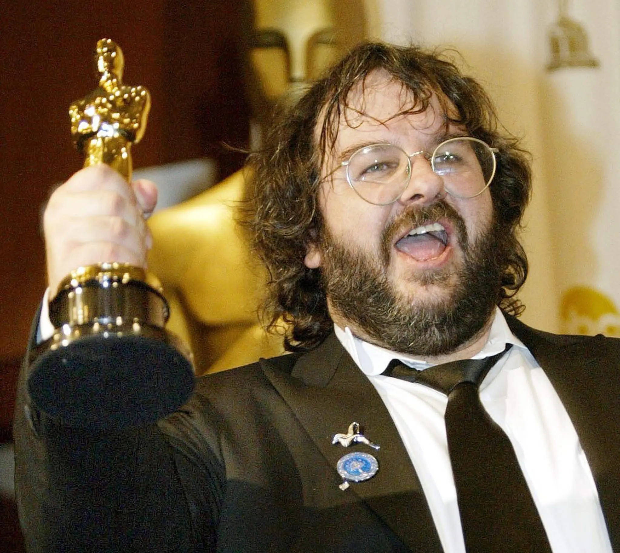 Peter Jackson esultante dopo la vittoria di ben 11 Oscar del suo film