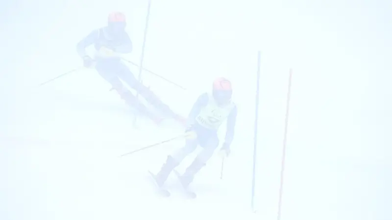 Bertagnolli vince l'oro in slalom con la guida Ravelli: la gara nella fitta nebbia - Foto Ansa © www.giornaledibrescia.it