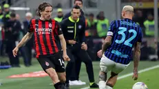 Modric del Milan e Dimarco dell'Inter - © Ansa www.giornaledibrescia.it