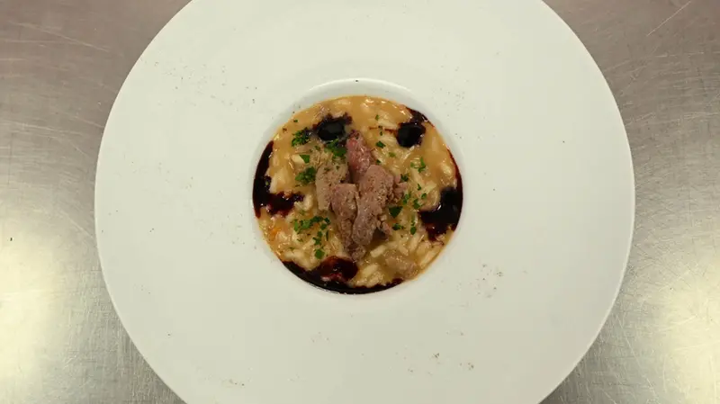 Risotto con frattaglie di pollo - Foto New Reporter Favretto © www.giornaledibrescia.it