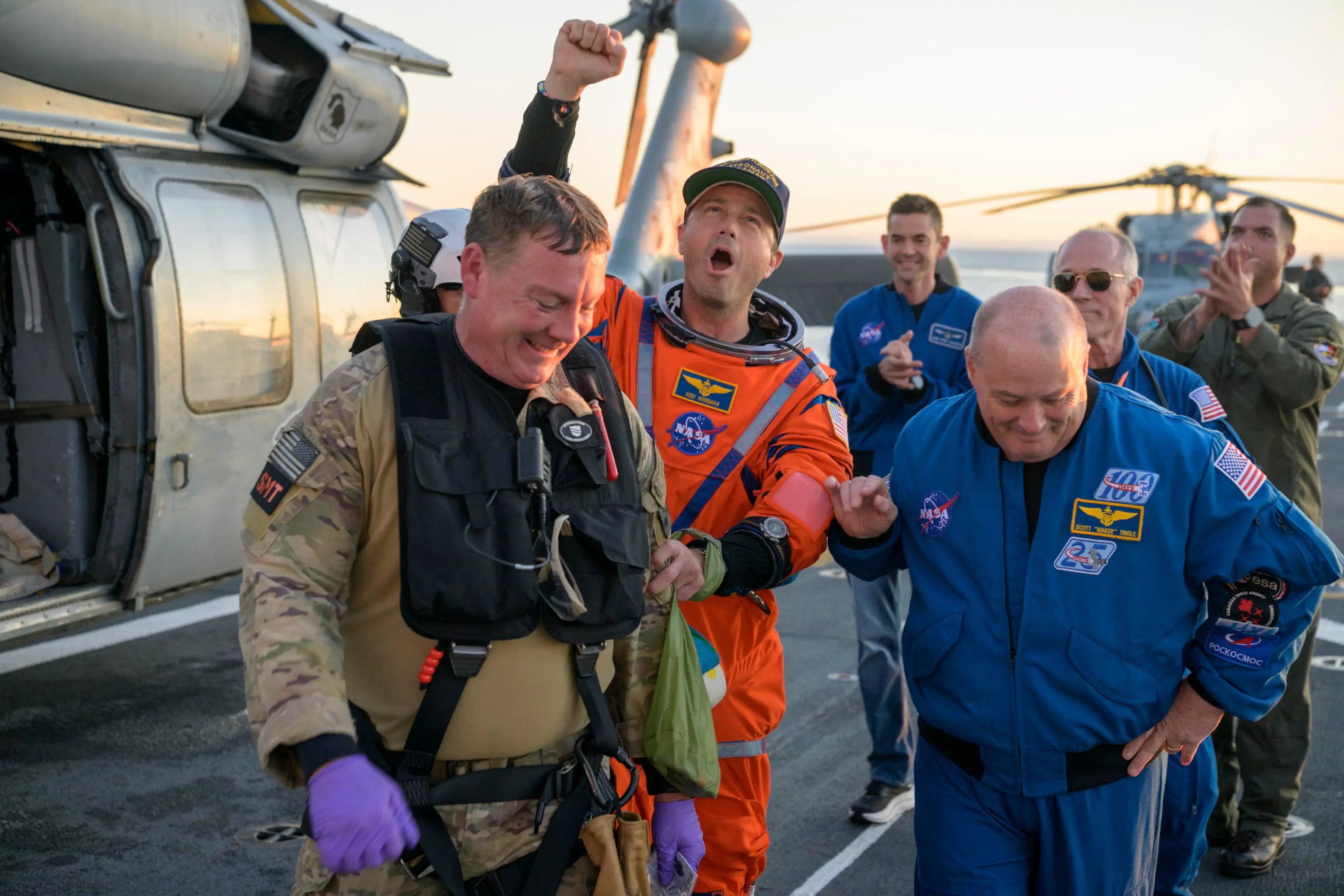 epa12882010 A handout photo made available by the National Aeronautics and Space Administration (NASA) shows NASA astronaut Reid Wiseman (C), Artemis II commander being assisted off the flight deck after arriving aboard USS John P. Murtha after he and fellow crewmates \wiseman2\ were extracted from their Orion spacecraft after splashdown, in the Pacific Ocean off the coast of California, 10 April 2026. NASA’s Artemis II mission took the quartet on a nearly 10-day journey around the Moon and back to Earth. Following a splashdown at 5:07 p.m. PDT (8:07 p.m. EDT), NASA, U.S. Navy, and U.S. Air Force teams worked to bring the Orion spacecraft aboard the recovery ship. EPA/BILL INGALLS / NASA / HANDOUT HANDOUT EDITORIAL USE ONLY/NO SALES