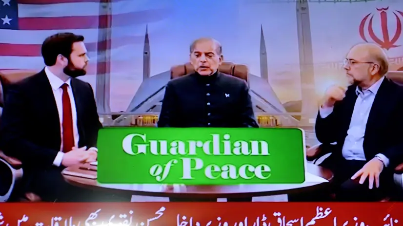 epa12882350 Vice President of the United States JD Vance (L) with Pakistani Prime Minister Shehbaz Sharif (C) and Iran's parliamentary Speaker Mohammad Bagher Ghalibaf (R) appear on a television screen during US-Iran talks, in Peshawar, Pakistan, 11 April 2026. An Iranian and US delegation arrived in Islamabad for planned peace talks amid a fragile two-week ceasefire following the conflict that began on 28 February 2026. EPA/BILAWAL ARBAB