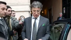 Umberto Bossi in uno scatto del 2003 - Foto Ansa/Danilo Schiavella © www.giornaledibrescia.it