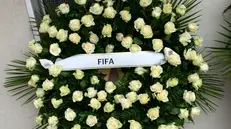 Funerali di Beccalossi: le corone di fiori