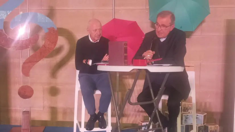 Don Rinaldi con il vescovo Tremolada