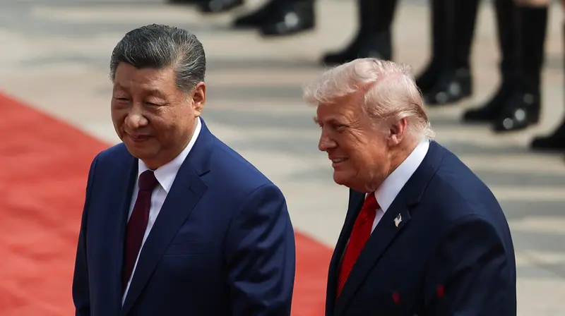 Il presidente americano Donald Trump ricevuto dal cinese Xi Jinping - Epa/Maxim Shemetov
