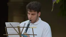 Pio Domenico Fazzolari durante un concerto della banda