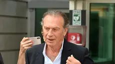 Massimo Cellino all'esterno del tribunale di Brescia