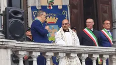 Il parroco don Marco Marella
