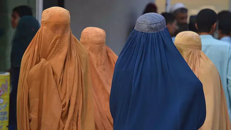 Donne in burqa - Foto Ansa © www.giornaledibrescia.it