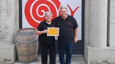 I titolari dell'osteria cittadina premiata con la Chiocciola